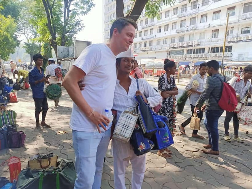 Best Combo Tour: Dabbawalas, Dhobi Ghat and Slum with Train - Dabbawalas in motion: lunchbox delivery that runs like a system