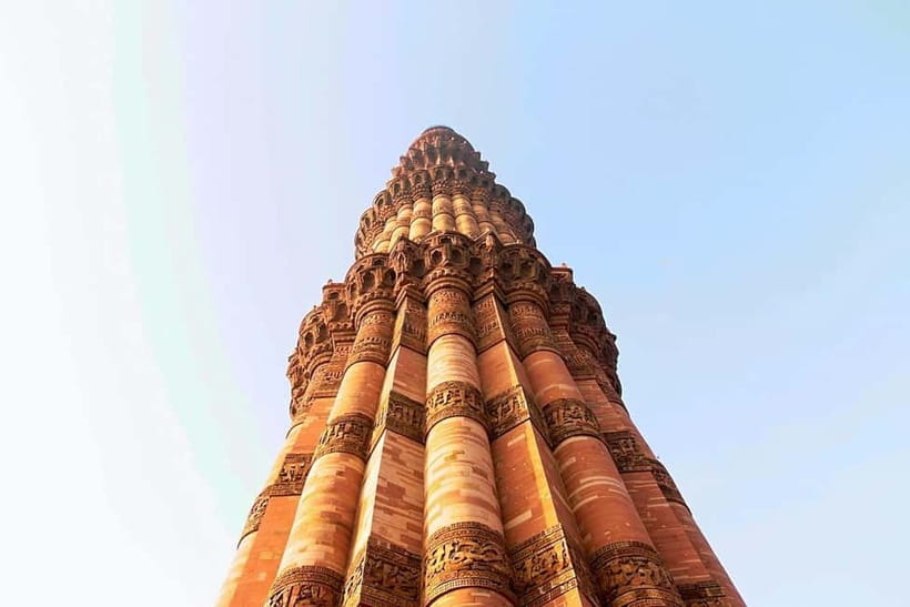 Delhi: Qutub Minar UNESCO World Heritage Site Walking Tour - Quwwat-ul-Islam Mosque: the first mosque in India, and the reused pieces