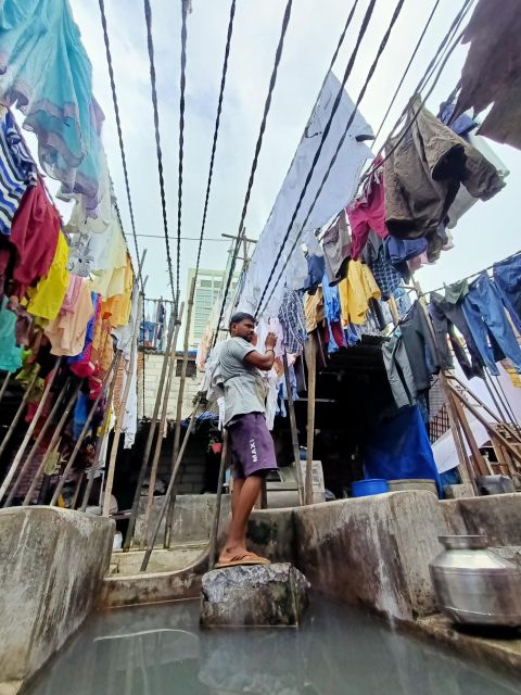 Dhobi Ghat Tour - Charcoal ironing: the finishing step that looks tough on purpose