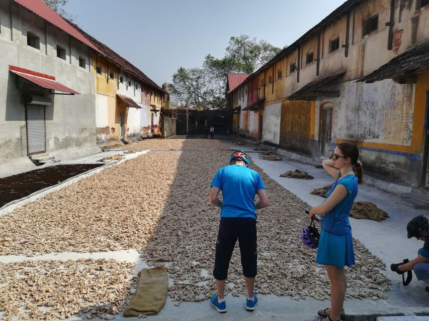 Fort Kochi Heritage Day Cycling Tour - Dhobi Khana public laundry: seeing daily work from street level