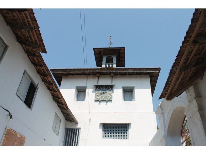 Fort Kochi & Mattanchery 3-Hour Walking Tour - Santa Cruz Basilica: white facade outside, paintings inside