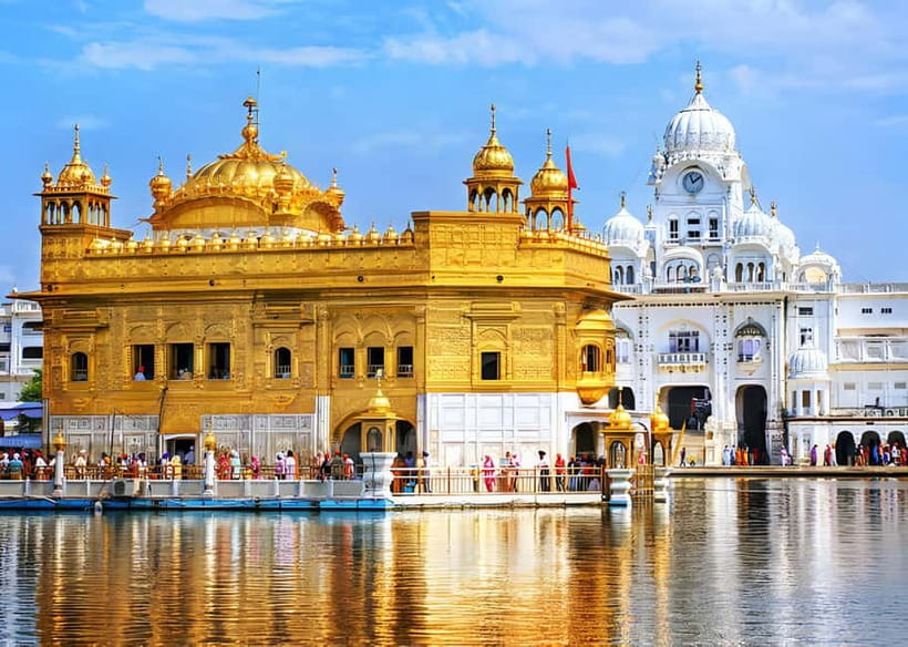 From Amritsar: Wagah Border Day Trip - Golden Temple Morning: Langar, Sacred Courtyards, and Punjabi Color