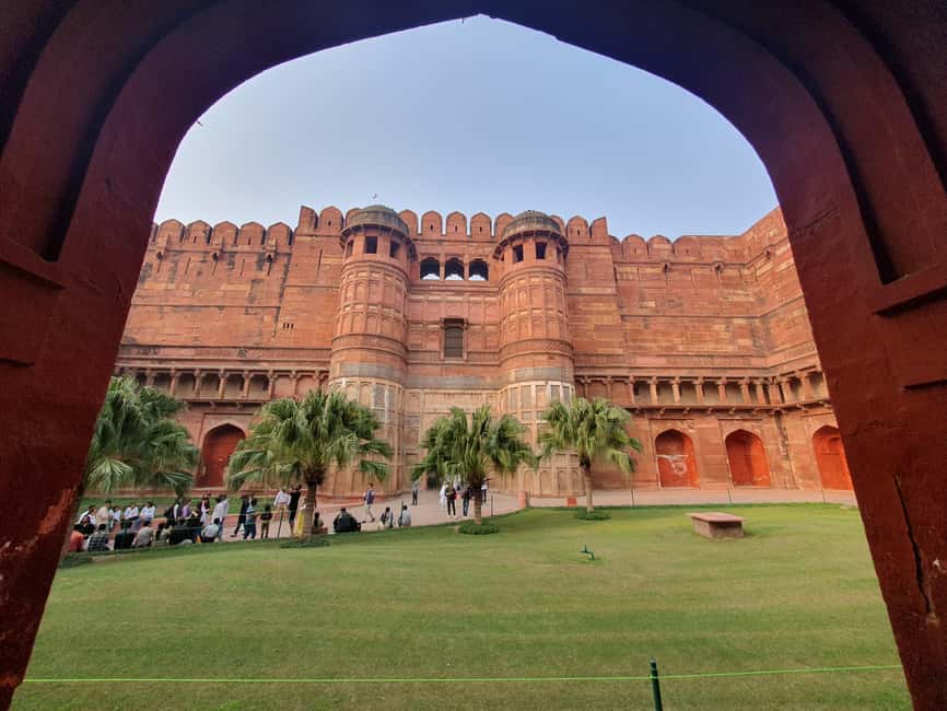 From Delhi: Deluxe Taj Mahal and Agra tour with Luxury Cars - Agra Fort in two hours: red sandstone, Akbar, and mixed design styles
