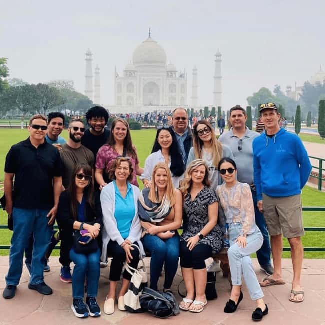 From Delhi: Taj Mahal & Agra Fort Shared Group Tour - Taj Mahal guide style: stories, photos, and crowd control