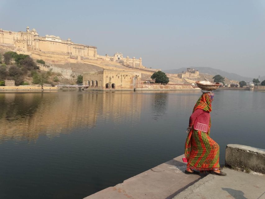 From Jaipur: Private Amber Fort, Jal Mahal and More Car Tour - The step well: architecture you feel in your body