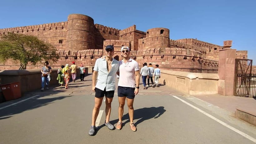 From Jaipur: Private Taj Mahal & Agra Day Trip with 5</em> Lunch – The Jaipur-to-Agra Drive: Private Comfort That Actually Matters’ /><br />
Jaipur to Agra is the kind of leg that can make or break your day. On this tour you’re in a private AC car with pickup from your hotel or any location in Jaipur, and you’re not doing the usual “find transport, haggle price, wait around” routine. The best part is consistency: you’re picked up, you’re driven, and you arrive with time to get your bearings before the big sightseeing push.</p>
<p><p>Plan for a long day in general. Even though the booking shows a wide duration range (3–12 hours), your sightseeing blocks are substantial: several hours of walking and guided time across multiple sites, plus driving. If you’re the type who likes calm mornings, this is a good fit—just remember that Agra days often start early because the Taj Mahal gets busy.</p>
</p>
<p><p>You’ll also appreciate small included items that reduce hassle in India heat and crowds: water bottles and umbrellas are provided. Those are the kinds of extras you notice when you need them, not when you’re checking off the itinerary on paper.</p>
</p>
<div style="margin: 20px 0; padding: 15px 0;"><p>You can also read our reviews of more private tours in Jaipur</p><ul style="margin: 10px 0; padding: 0; list-style: none;"><li style="margin: 0 0 10px 0; padding: 0 0 10px 0; border-bottom: 1px solid #eee; display: flex; align-items: flex-start; gap: 12px; line-height: 1.4;"><a href="https://guidemyindia.com/jaipur-private-full-day-sightseeing-tour-by-car-with-guide/" aria-hidden="true" tabindex="-1"><img decoding="async" style="width: 80px; height: 60px; object-fit: cover; border-radius: 4px; flex-shrink: 0;" src="https://a.guidemyindia.com/wp-content/uploads/jaipur-private-full-day-sightseeing-tour-by-car-with-guide-150x150.jpg" alt="" loading="lazy"></a><div><a href="https://guidemyindia.com/jaipur-private-full-day-sightseeing-tour-by-car-with-guide/">Jaipur: Private Full Day Sightseeing Tour By Car with Guide</a><br><span style="font-size: 0.82em; color: #555; margin-top: 2px;"><span style="color: #f5a623;">★</span> 4.9 &middot; 1,839 reviews</span></div></li><li style="margin: 0 0 10px 0; padding: 0 0 10px 0; border-bottom: 1px solid #eee; display: flex; align-items: flex-start; gap: 12px; line-height: 1.4;"><a href="https://guidemyindia.com/jaipur-private-sightseeing-day-tour-with-guide-by-car/" aria-hidden="true" tabindex="-1"><img decoding="async" style="width: 80px; height: 60px; object-fit: cover; border-radius: 4px; flex-shrink: 0;" src="https://a.guidemyindia.com/wp-content/uploads/jaipur-private-sightseeing-day-tour-with-guide-by-car-150x150.jpg" alt="" loading="lazy"></a><div><a href="https://guidemyindia.com/jaipur-private-sightseeing-day-tour-with-guide-by-car/">Jaipur: Private Sightseeing Day Tour with Guide by Car</a><br><span style="font-size: 0.82em; color: #555; margin-top: 2px;"><span style="color: #f5a623;">★</span> 4.8 &middot; 773 reviews</span></div></li><li style="margin: 0; padding: 0; border-bottom: none; display: flex; align-items: flex-start; gap: 12px; line-height: 1.4;"><a href="https://guidemyindia.com/from-delhi-private-3-day-golden-triangle-tour-with-hotels/" aria-hidden="true" tabindex="-1"><img decoding="async" style="width: 80px; height: 60px; object-fit: cover; border-radius: 4px; flex-shrink: 0;" src="https://a.guidemyindia.com/wp-content/uploads/from-delhi-private-3-day-golden-triangle-tour-with-hotels-150x150.jpg" alt="" loading="lazy"></a><div><a href="https://guidemyindia.com/from-delhi-private-3-day-golden-triangle-tour-with-hotels/">From Delhi: Private 3-Day Golden Triangle Tour with Hotels</a><br><span style="font-size: 0.82em; color: #555; margin-top: 2px;"><span style="color: #f5a623;">★</span> 4.9 &middot; 339 reviews</span></div></li></ul></div><h2 id="taj-mahal-fast-track-plus-3-guided-hours-what-you-should-do-first">Taj Mahal Fast-Track Plus 3 Guided Hours: What You Should Do First</h2>
<p> Lunch – Taj Mahal Fast-Track Plus 3 Guided Hours: What You Should Do First’ /><br />
The headline is the Taj Mahal. The tour includes guided time (up to three hours) and <strong>fast-track entry</strong> to skip the slow-ticket crush. Once you’re inside, your guide’s job is more than facts—they help you move in the right order so you don’t waste your best light and angles circling blindly.</p>
<p><p>Here’s how I’d use your Taj Mahal time if I were planning your day:</p>
</p>
<p><p>1) <strong>Start with wide views</strong> so your brain locks in the full scale of the complex.</p>
</p>
<p><p>2) Then <strong>work your way toward the details</strong>: the marble patterns, the symmetry, and the way the building plays with shadows.</p>
</p>
<p><p>3) Save a second pass for <strong>photo positions</strong>. Many guides on this route are praised for taking pictures at multiple viewpoints, including quick phone shots with good framing.</p>
</p>
<p><p>Guides such as Mehfooz (Jelly), Ankur Sharma, Imran Ali Khan, Arif, and Amit show up in real-world group experiences, and a common thread is clear instructions plus photo help. If you want variety—like standing shots, close-in marble detail shots, and shots that avoid overcrowded backgrounds—ask your guide to suggest a sequence. You’ll get more keepers that way.</p>
</p>
<h3 id="the-friday-rule-dont-skip-this">The Friday rule (don’t skip this)</h3>
<p>The Taj Mahal is closed every Friday. If you land on a Friday, your whole plan needs a reset. Build your Agra day around opening days, not around a travel “maybe it works out” mood.</p>
<h3 id="bring-the-essentials">Bring the essentials</h3>
<p>You’ll need a passport or ID card for entry, and sunglasses help because the glare is real once you’re outside the gate.</p>
<h2 id="agra-fort-60-minutes-that-adds-real-perspective">Agra Fort: 60 Minutes That Adds Real Perspective</h2>
<p> Lunch – Agra Fort: 60 Minutes That Adds Real Perspective’ /><br />
After the Taj Mahal, you’ll move to Agra Fort for a guided visit (about one hour). This stop matters because it shifts you from the romantic, iconic Taj Mahal story to the larger Mughal setting—walls, power, and architecture that frame how rulers shaped this region.</p>
<p><p>In an hour, you won’t cover every corner, but you can get the key idea: the fort helps you understand Agra as more than one monument. Your guide will likely point out what’s worth your attention rather than letting you wander.</p>
</p>
<p><p>What I like here is the pacing. Taj Mahal days often feel like nonstop “look, photograph, move.” Agra Fort gives you a different texture of sights—more rugged, more defensive, and often less about pure symmetry and more about how the place functioned.</p>
</p>
<p><p>If you’re a photo person, ask your guide for vantage points early. The best Fort photos usually come from knowing where to stand rather than from holding your camera up at random.</p>
</p>
<div style="margin: 20px 0; padding: 15px 0;"><p>You can also read our reviews of more tours and experiences in Jaipur</p><ul style="margin: 10px 0; padding: 0; list-style: none;"><li style="margin: 0 0 10px 0; padding: 0 0 10px 0; border-bottom: 1px solid #eee; display: flex; align-items: flex-start; gap: 12px; line-height: 1.4;"><a href="https://guidemyindia.com/from-jaipur-private-taj-mahal-agra-day-trip-with-5-lunch/" aria-hidden="true" tabindex="-1"><img decoding="async" style="width: 80px; height: 60px; object-fit: cover; border-radius: 4px; flex-shrink: 0;" src="https://a.guidemyindia.com/wp-content/uploads/from-jaipur-private-taj-mahal-agra-day-trip-with-5-lunch-150x150.jpg" alt="" loading="lazy"></a><div><a href="https://guidemyindia.com/from-jaipur-private-taj-mahal-agra-day-trip-with-5-lunch/">From Jaipur: Private Taj Mahal & Agra Day Trip with 5* Lunch</a><br><span style="font-size: 0.82em; color: #555; margin-top: 2px;"><span style="color: #f5a623;">★</span> 4.9 &middot; 161 reviews</span></div></li><li style="margin: 0 0 10px 0; padding: 0 0 10px 0; border-bottom: 1px solid #eee; display: flex; align-items: flex-start; gap: 12px; line-height: 1.4;"><a href="https://guidemyindia.com/jaipur-home-cooking-experience-with-authentic-lunch-dinner/" aria-hidden="true" tabindex="-1"><img decoding="async" style="width: 80px; height: 60px; object-fit: cover; border-radius: 4px; flex-shrink: 0;" src="https://a.guidemyindia.com/wp-content/uploads/jaipur-home-cooking-experience-with-authentic-lunch-dinner-150x150.jpg" alt="" loading="lazy"></a><div><a href="https://guidemyindia.com/jaipur-home-cooking-experience-with-authentic-lunch-dinner/">Jaipur Home Cooking Experience with Authentic Lunch/Dinner</a><br><span style="font-size: 0.82em; color: #555; margin-top: 2px;"><span style="color: #f5a623;">★</span> 4.9 &middot; 10 reviews</span></div></li><li style="margin: 0; padding: 0; border-bottom: none; display: flex; align-items: flex-start; gap: 12px; line-height: 1.4;"><a href="https://guidemyindia.com/jaipur-private-city-tour-with-car-guide-tickets-lunch/" aria-hidden="true" tabindex="-1"><img decoding="async" style="width: 80px; height: 60px; object-fit: cover; border-radius: 4px; flex-shrink: 0;" src="https://a.guidemyindia.com/wp-content/uploads/jaipur-private-city-tour-with-car-guide-tickets-lunch-150x150.jpg" alt="" loading="lazy"></a><div><a href="https://guidemyindia.com/jaipur-private-city-tour-with-car-guide-tickets-lunch/">Jaipur: Private City Tour with Car, Guide, Tickets & Lunch</a><br><span style="font-size: 0.82em; color: #555; margin-top: 2px;"><span style="color: #f5a623;">★</span> 4.9 &middot; 10 reviews</span></div></li></ul></div><h2 id="baby-taj-the-quiet-detour-that-makes-the-day-feel-complete">Baby Taj: The Quiet Detour That Makes the Day Feel Complete</h2>
<p> Lunch – Baby Taj: The Quiet Detour That Makes the Day Feel Complete’ /><br />
Next up is Baby Taj (a guided visit around 30 minutes). This is a short stop, but it’s a smart one. Baby Taj gives you a “smaller-scale” Mughal feel and is typically easier to experience without the heaviest crowds you’ll see at the main Taj complex.</p>
<p><p>This is also a practical break. After time at the Taj Mahal and Agra Fort, you get a chance to slow down, take calmer photos, and enjoy architecture without rushing every few minutes.</p>
</p>
<p><p>If you only had time for one monument besides the Taj, you’d probably choose Agra Fort. But if you want the day to feel rounded—and you like architecture more than just celebrity landmarks—Baby Taj is a strong add-on.</p>
</p>
<h2 id="lunch-at-doubletree-by-hilton-why-a-5-star-break-is-worth-it">Lunch at DoubleTree by Hilton: Why a 5-Star Break Is Worth It</h2>
<p> Lunch – Lunch at DoubleTree by Hilton: Why a 5-Star Break Is Worth It’ /><br />
If you choose the lunch option, you’ll eat at DoubleTree by Hilton Hotel Agra (about 45 minutes). This matters more than it sounds. A day trip like this can go sideways when lunch turns into a time sink—long waits, uncertain food, or “we’ll stop somewhere” with no plan.</p>
<p><p>A booked, structured lunch gives you:</p>
</p>
<ul>
<li>predictable timing (so you don’t lose your Fort time),</li>
<li>a comfortable reset in a proper hotel environment,</li>
<li>and a multi-cuisine buffet format that works for different tastes and spice tolerance.</li>
</ul>
<p><p>One caution: drinks are not included. If you like bottled water beyond what’s already provided, or you want something else with your meal, plan for extra spending.</p>
</p>
<p><p>Also, you’ll want to use those 45 minutes intentionally. Eat, refill water, and take a quick breather before you head back into crowds and walking.</p>
</p>
<h2 id="timing-crowds-and-photo-strategy-plus-photo-people">Timing, Crowds, and Photo Strategy (Plus Photo People)</h2>
<p><img width="650" height="650" decoding="async" src=