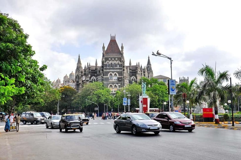 From Mumbai: Day Trip to Global Pagoda and Kanheri Caves - The guided tour adds the missing layer