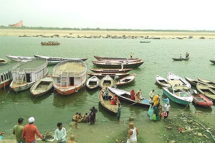 From Varanasi: Sunrise Boat Tour and Heritage Walk - What to wear and bring for a respectful, comfortable morning