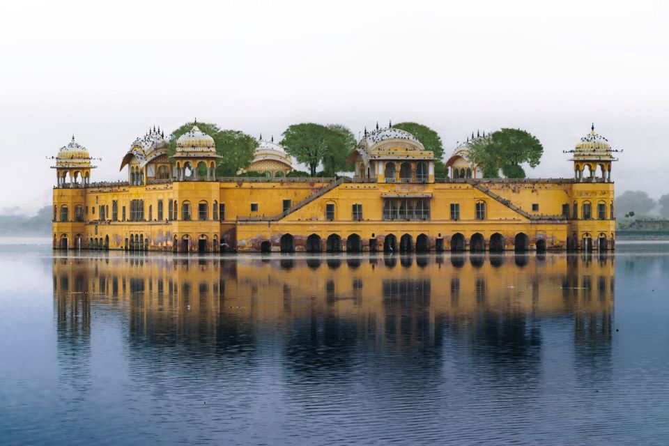 Full day Jaipur sightseeing tour by tuk tuk. - Hawa Mahal photo stop: the Palace of Winds, seen right