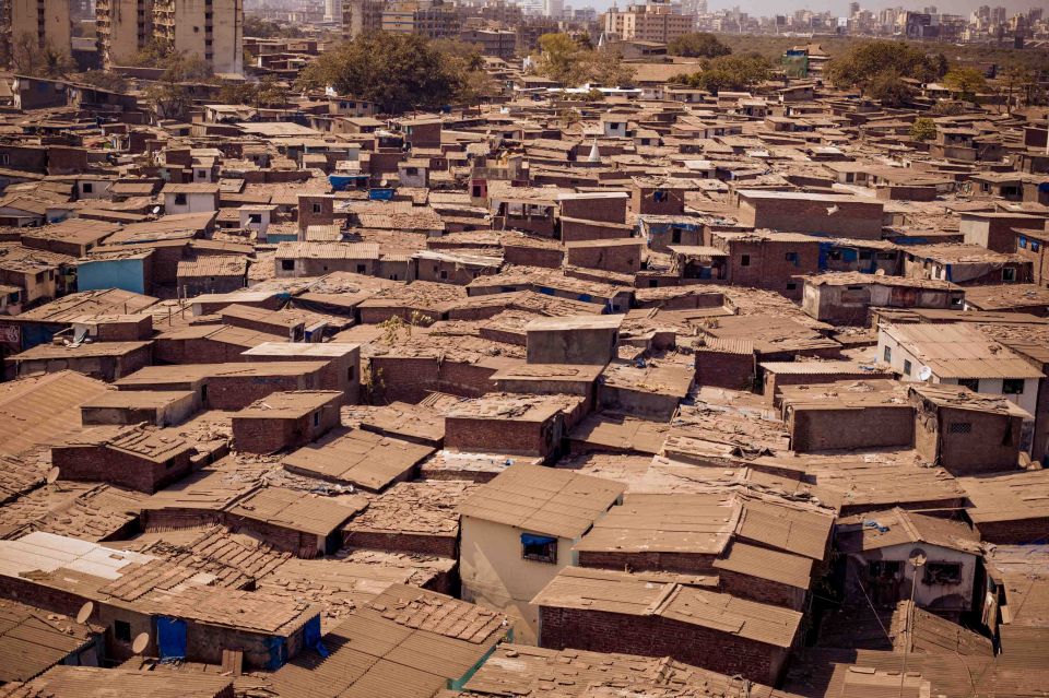 Mumbai: Dharavi Tour Including Car Transfer - Dhobi Ghat: watching the city’s open-air laundry machine work