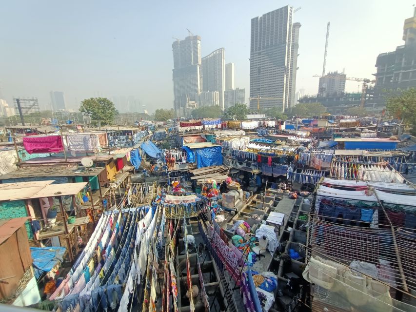 Mumbai: Dhobi Ghat Tour with Dharavi and Train Ride Options - What the guide adds: clarity beats guessing